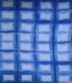 shibori, pliage tye dye, motif rectangle dans une cuve d'indigo naturel.